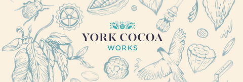 Logo of York Cocoa Works with botanical illustrations on a beige background