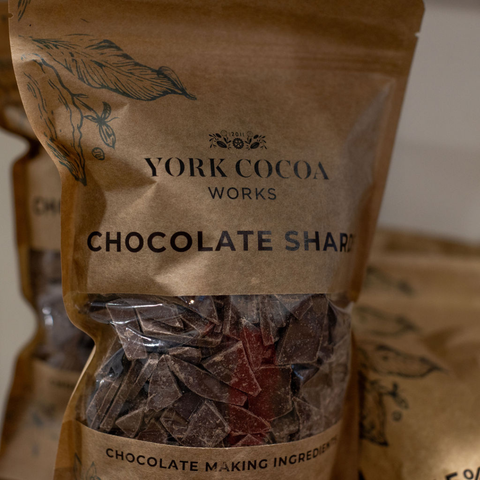 Bag of York Cocoa Works chocolate shards with visible text and branding.