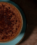 Overhead shot of dark hot chocolate in a mug