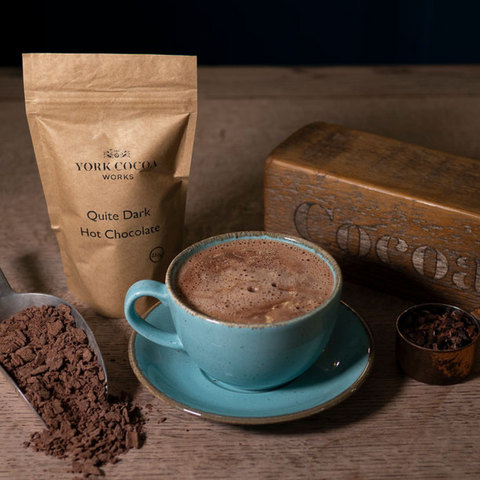 Quite Dark 70% Hot Chocolate Packet with mug full of hot chocolate